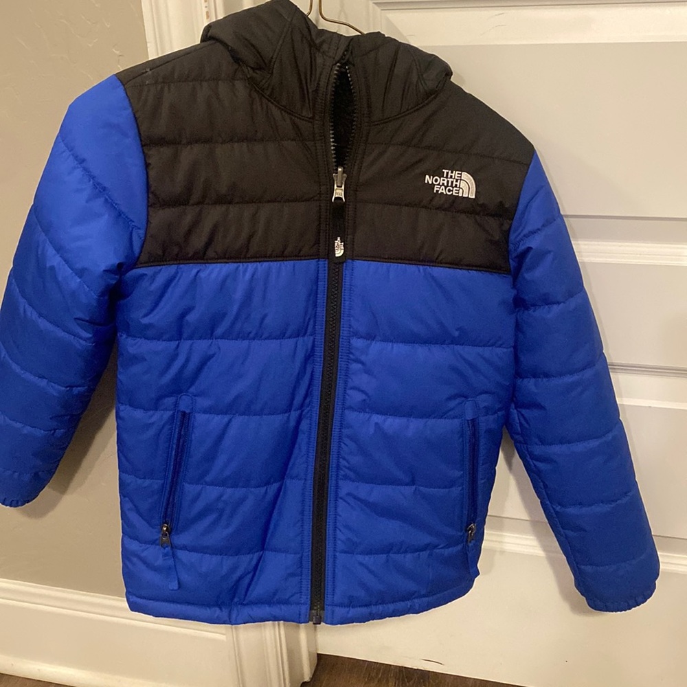Reversible North Face jacket, boys.